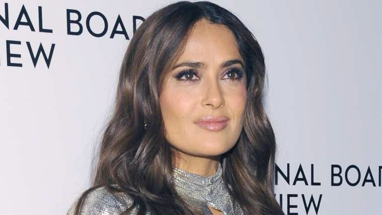 Read more about the article Salma Hayek javno ljubeča do Adama Sandlerja