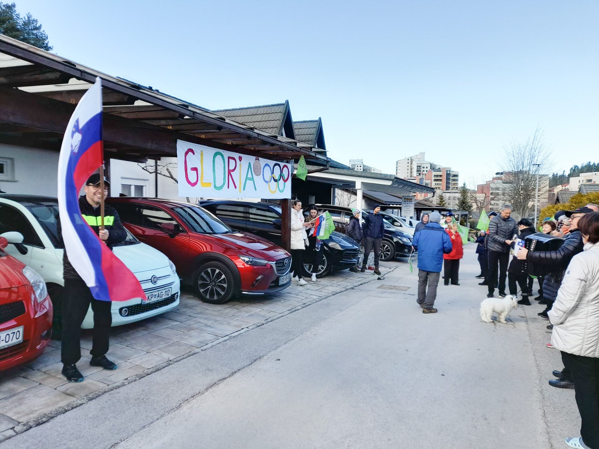 Gloria Kotnik - slovenska deskarka na snegu - bronasta olimpijska medalja - Partner bronaste olimpijke Željko s sinom Majem